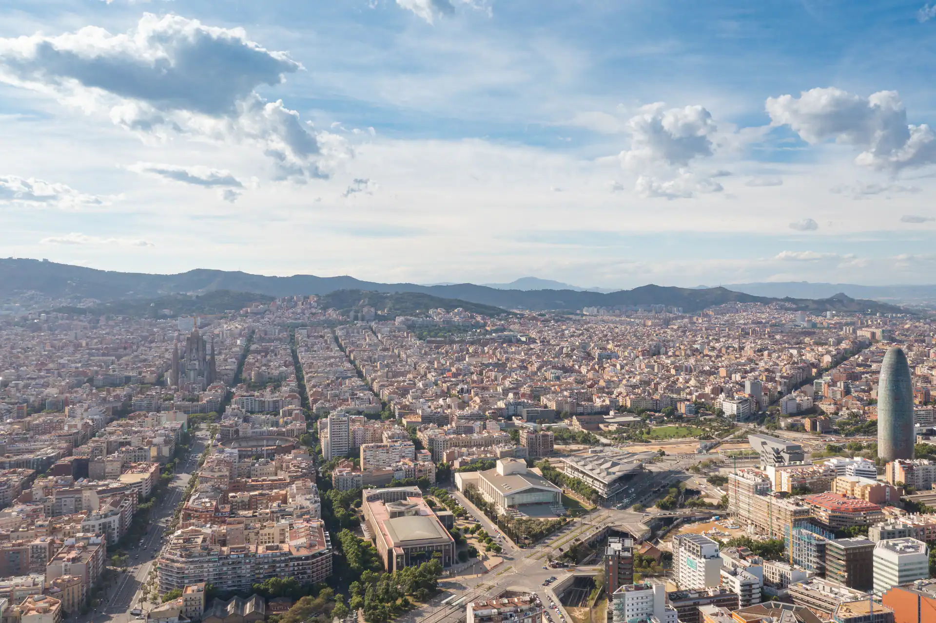 Aerial view of La Sagrada Familia and Agbar Tower in Barcelona, Spain