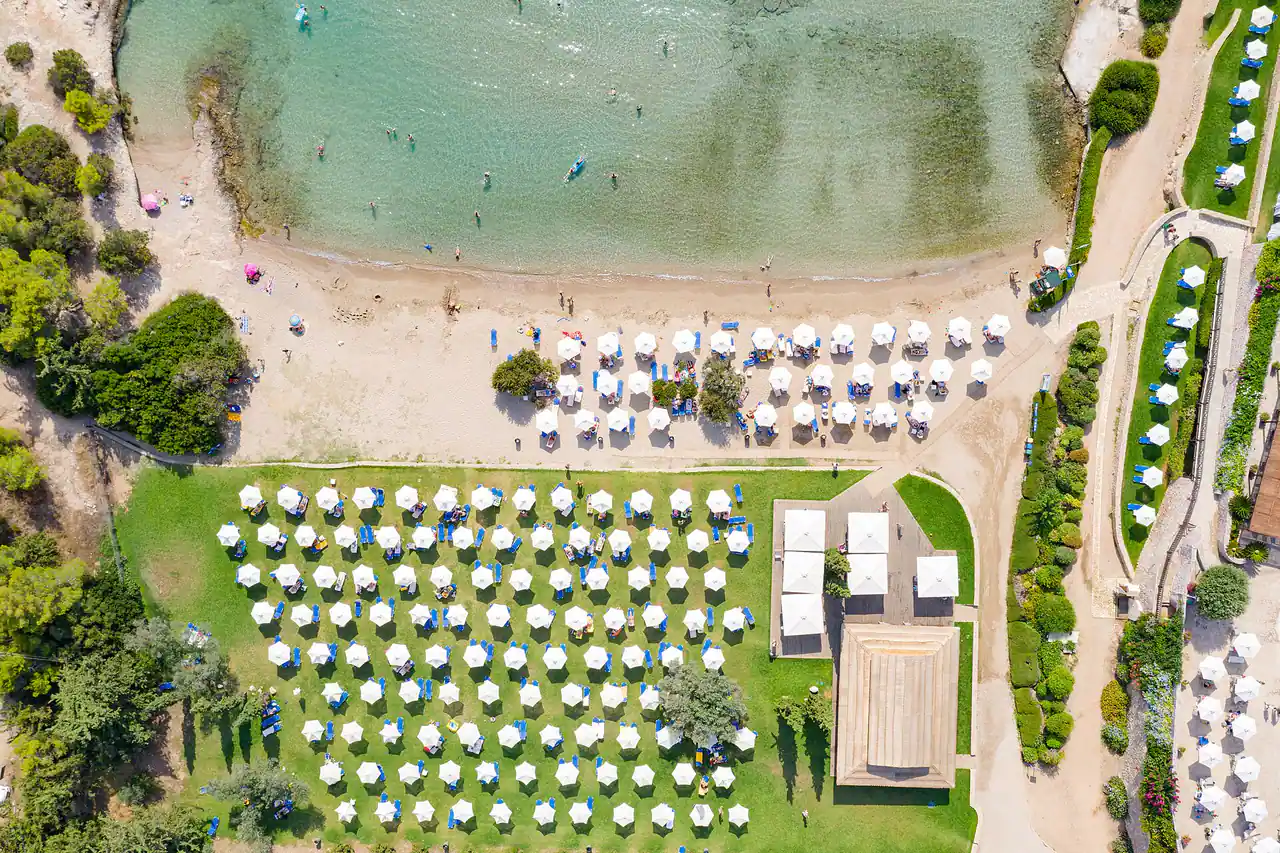 Bird's eye view of AKS Hinitsa Bay private beach in Porto Heli, Greece